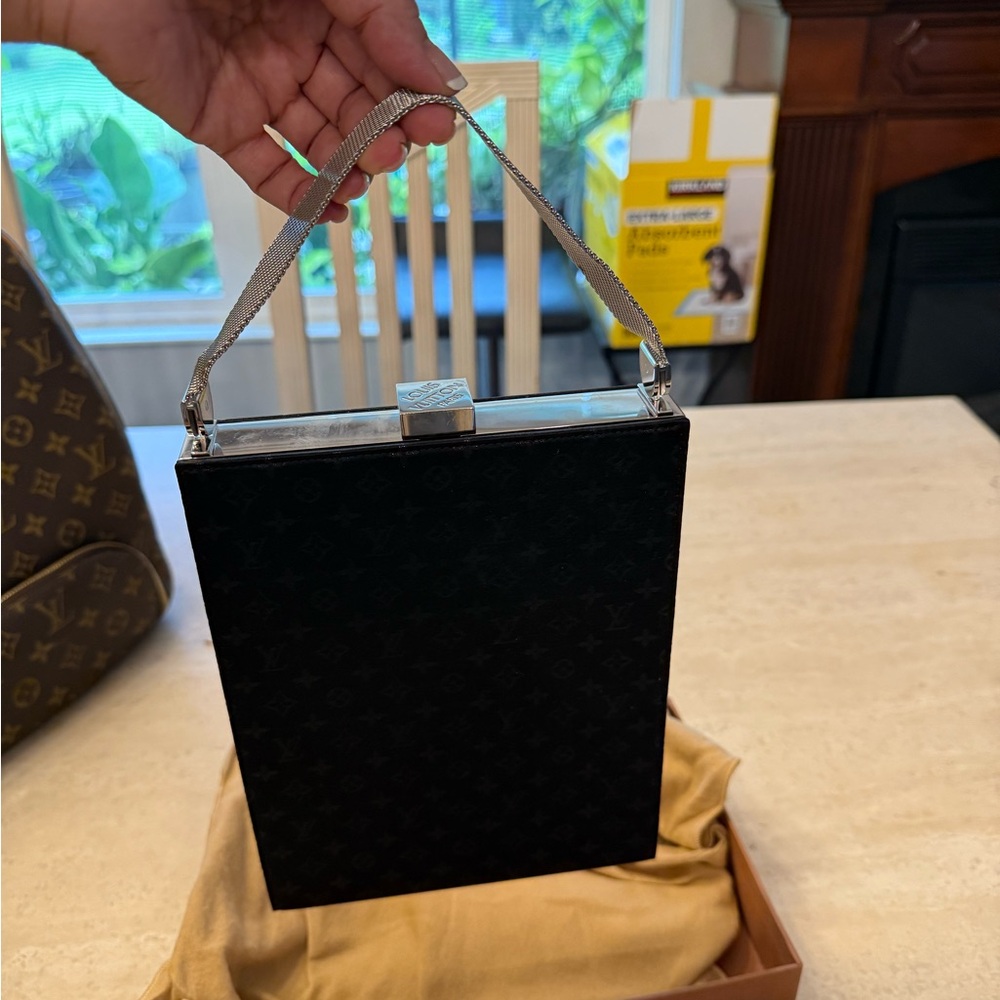 Louis Vuitton Black Clutch with Silver Accents